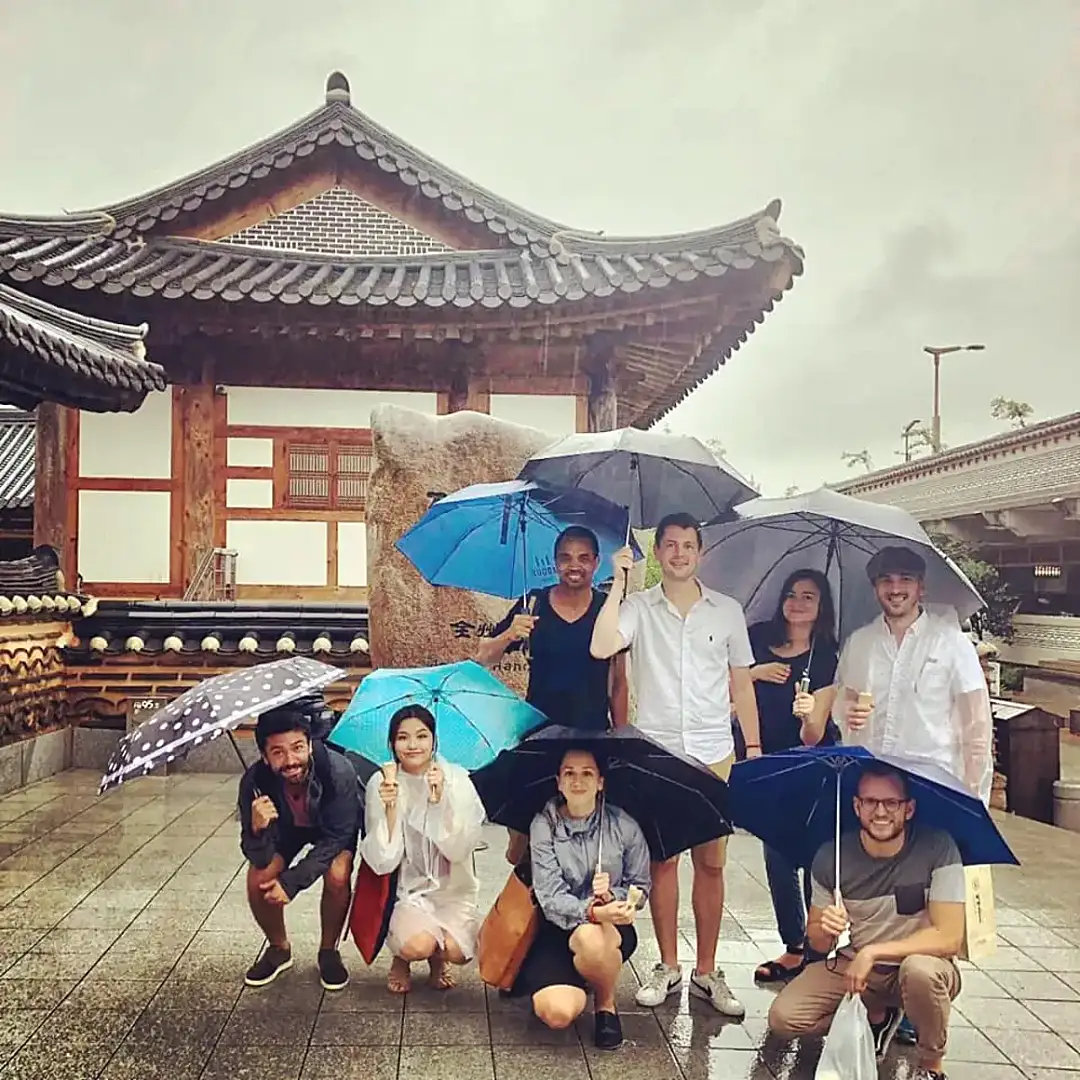 Tom in South Korea with his friends / colleagues