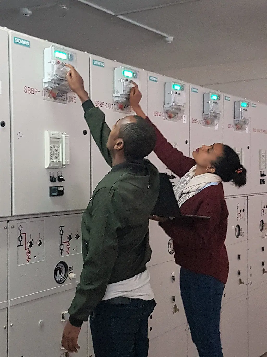 EEU staff inspect feeder meters at West Addis Ababa Substation, Ethiopia after being trained by Power Africa. 