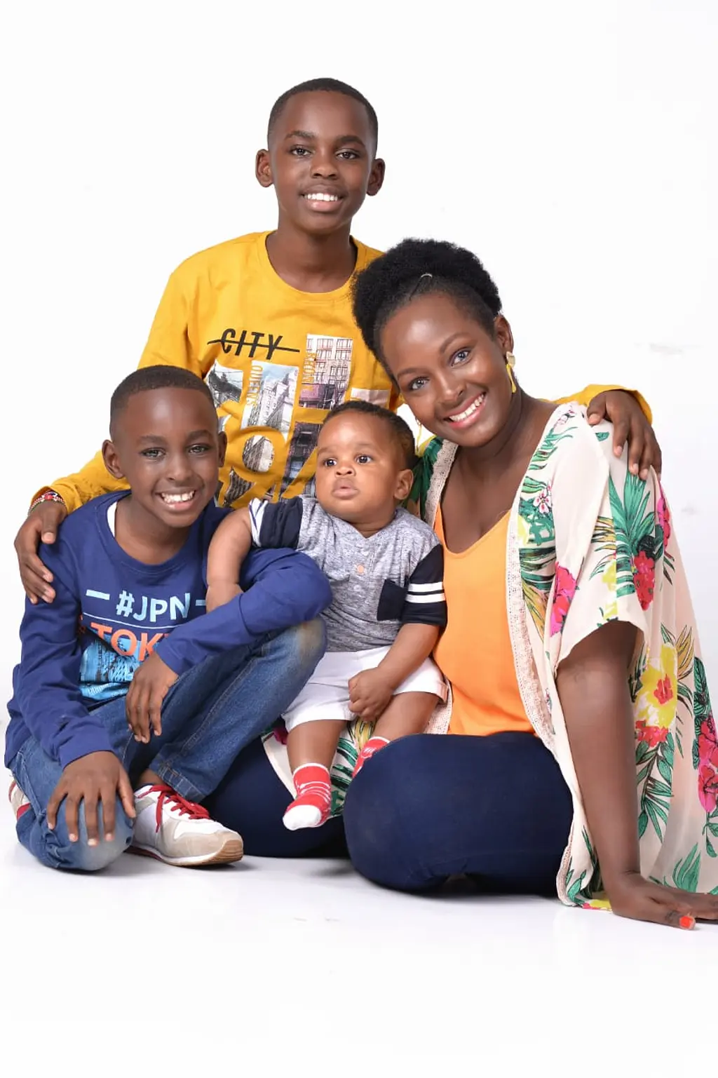 Mary Shompole, an RTI staff member based in Kenya, and her sons