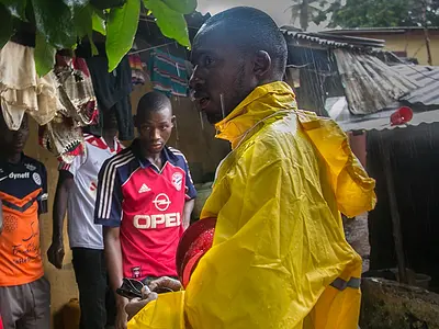 Community health worker conducts home visit in Matam Conakry, Guinea