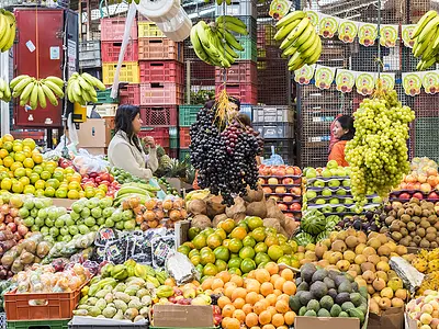 People visiting a fruit market in Bogata, Colombia