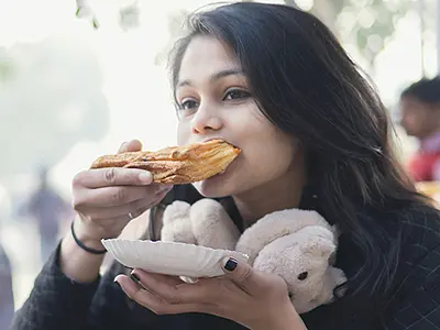 Indian teens eating street food
