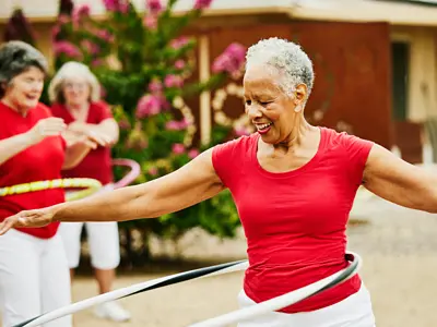 Elderly woman in exercise group