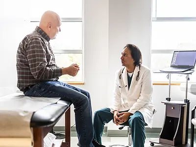 Doctor consults patient