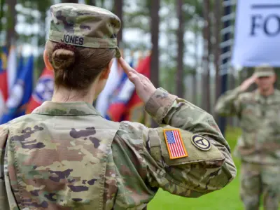 Service member salutes