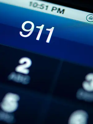 Photo of phone display dialing 911.