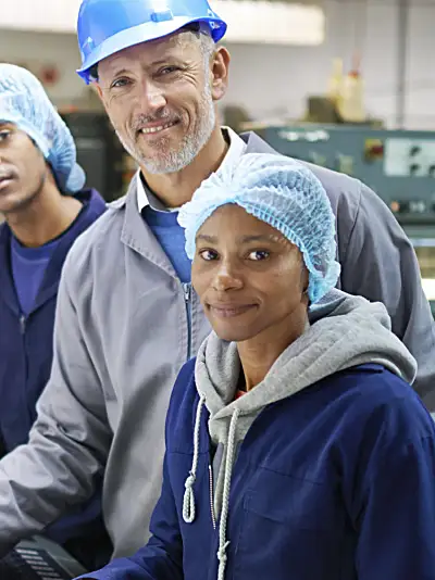 apprentices and instructor in a print shop