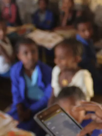 A teacher and students in Ethiopia