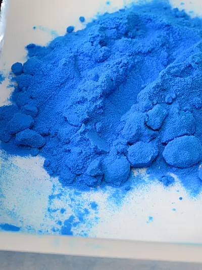 Blue powder on plate