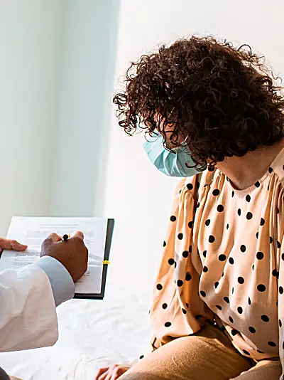 doctor takes time to explain treatment to his patient