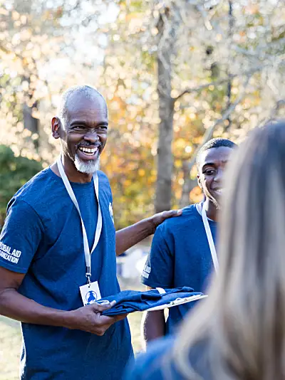 Community volunteer with group