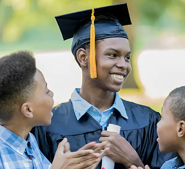 Teens celebrate their brother's graduation