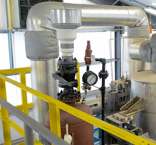 Man working on machinery in the ETDF