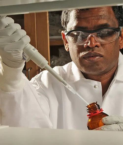 Research biochemist Wimal Pathmasiri in the lab