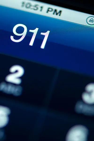 Photo of phone display dialing 911.