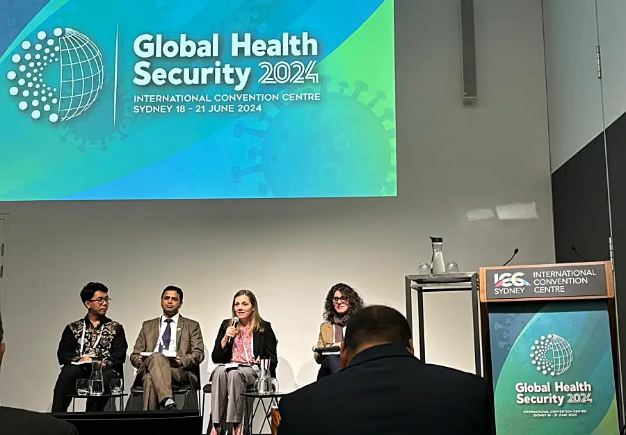 Photo of a panel of people onstage at the Global Health Security 2024 conference