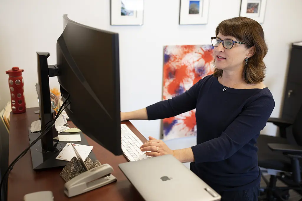 Economic development specialist Sara Lawrence works in her office at RTI International. 
