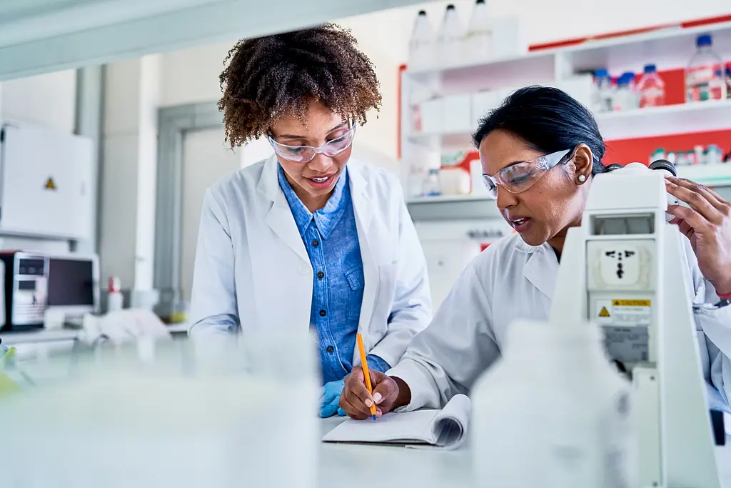 Two women of color in a lab