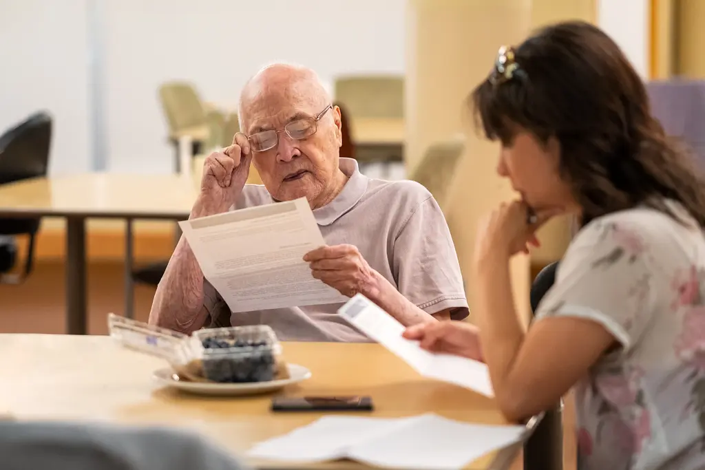 Senior man reviewing paperwork