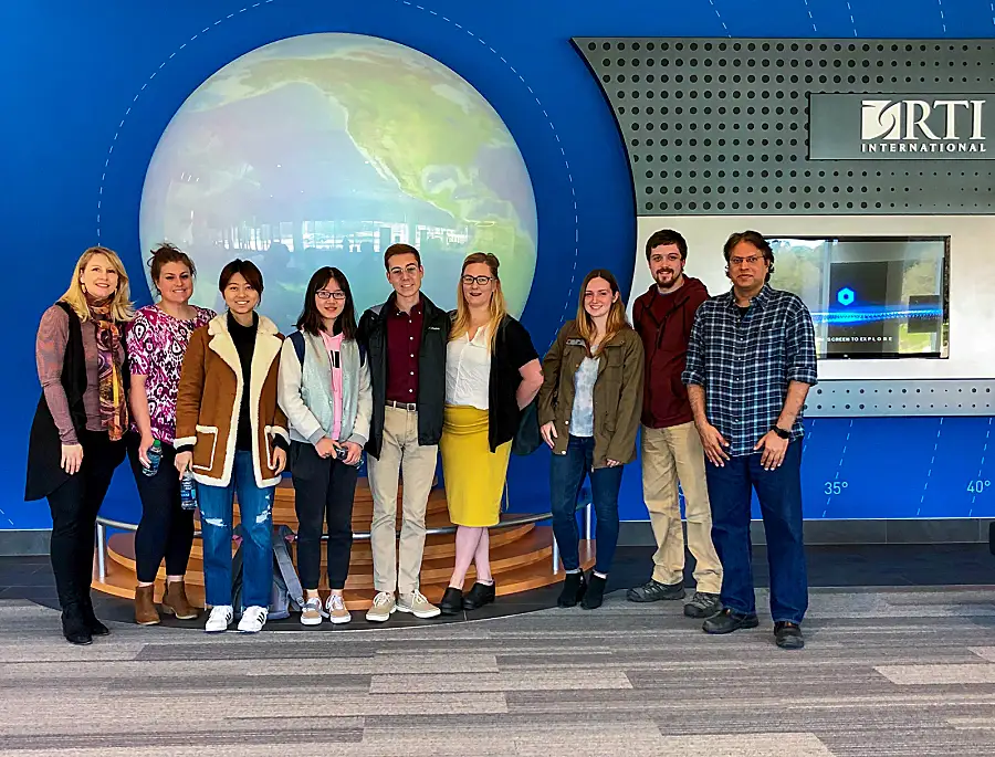 During a visit to the RTI campus, Duke students that participated in the 2019 Policy Idol “Team Uganda” pose together with Alison LeFew (far left), their team mentor and project manager for the RTI-Duke Global Development Initiative.