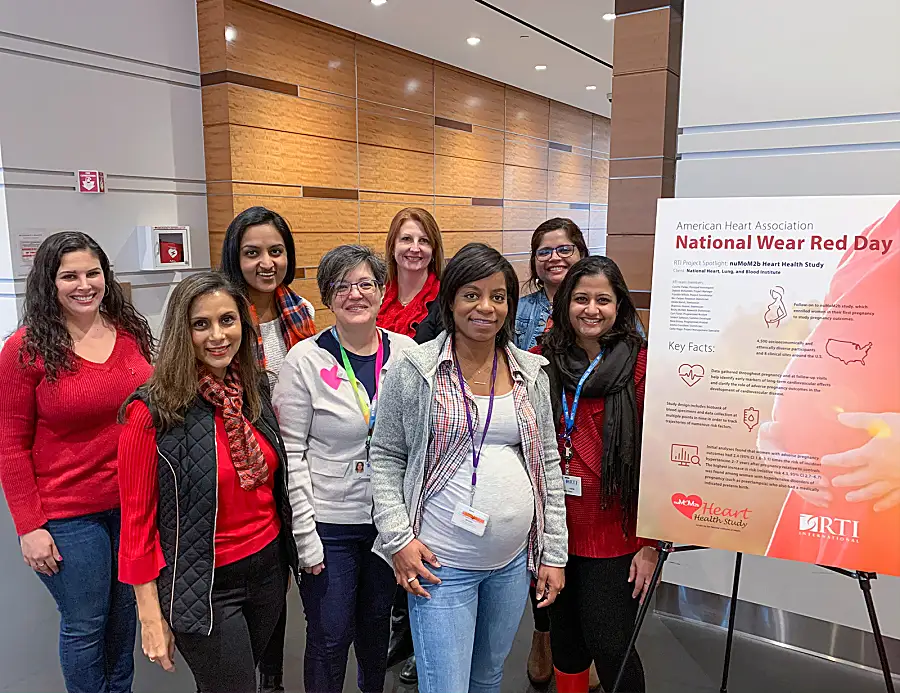 A group of WALS ERG members celebrate Wear Red Day at RTI.