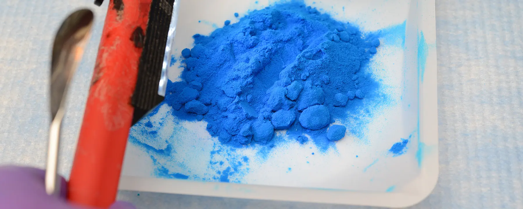 Blue powder on plate
