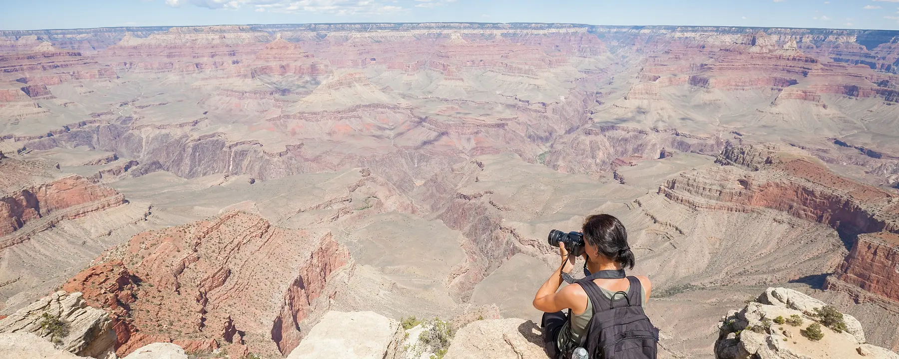 Woman looking at Grand Canyon