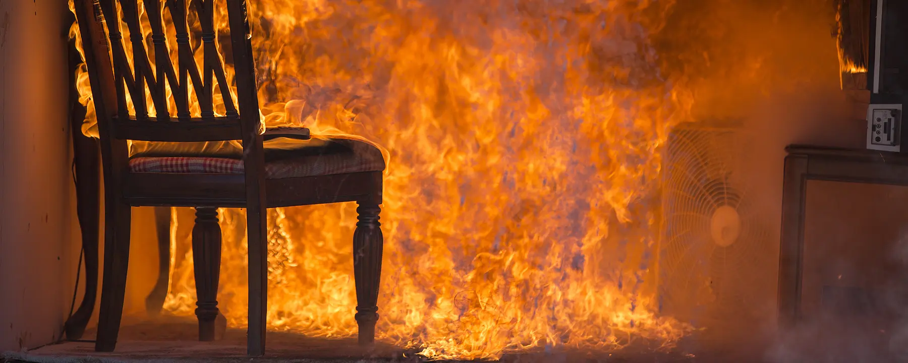 Chair in a room on fire