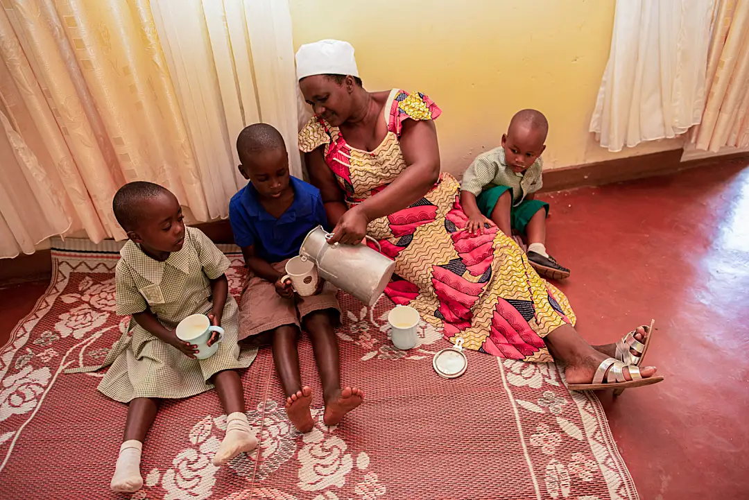 Angelica Mukayizere is a Milk Collection Manager for Green Foods, a USAID supported agribusiness in Rwanda that produces dairy products for retail sale. Angelica supports her family of two children using money from her job.