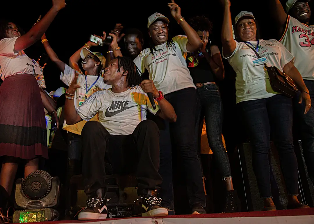 A group of people celebrating at night