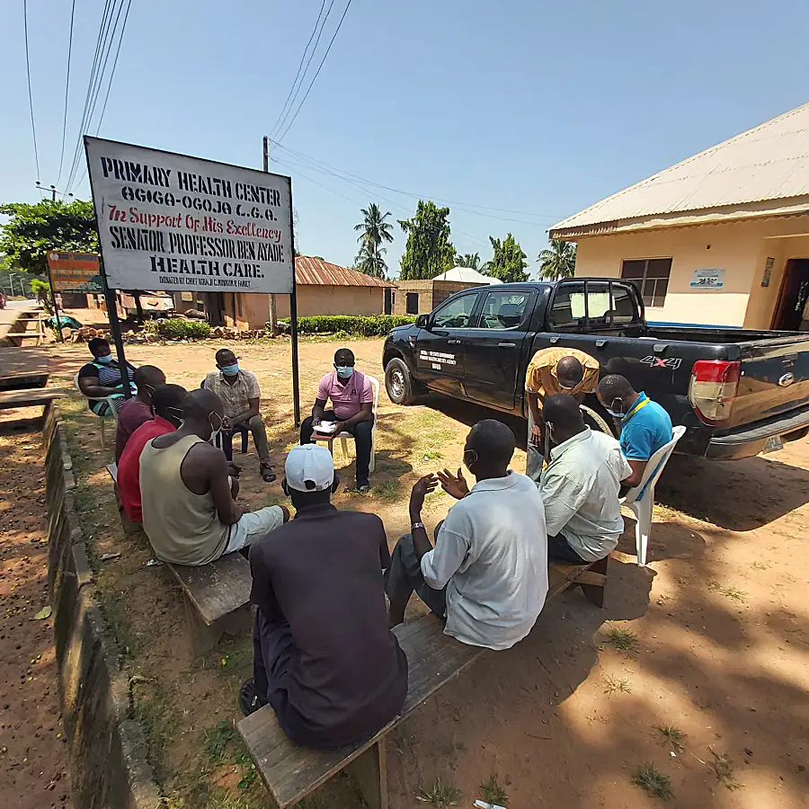 Health workers in Nigeria discuss NTD treatments during the COVID-19 pandemic.