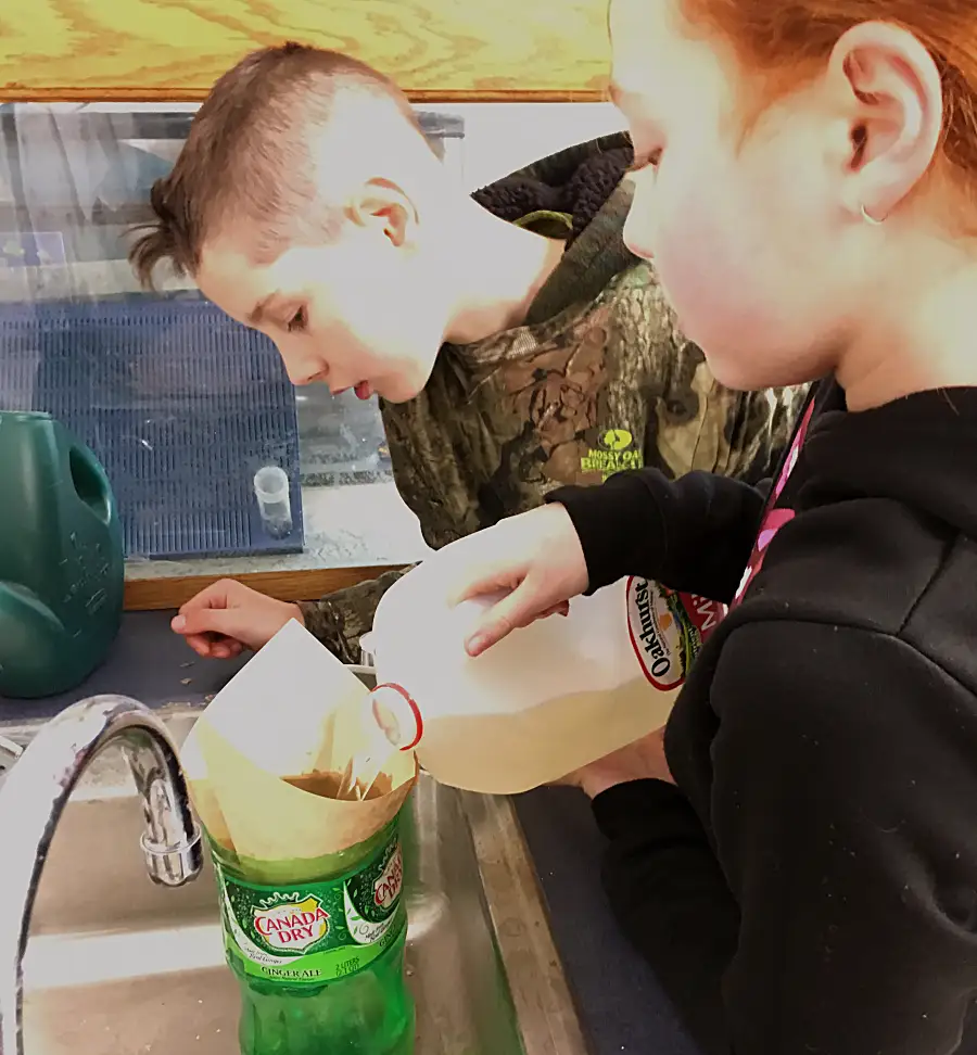 Edna Drinkwater School students sampling seawater for microplastic study