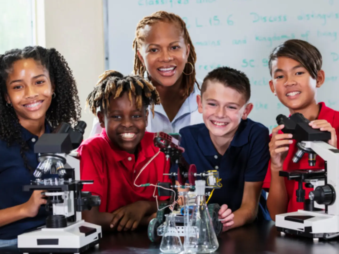 Female teacher with group of middle school students