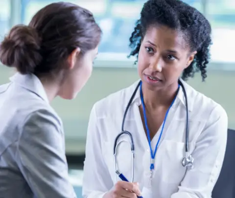 Doctor talking to a patient