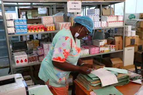 nurse looking over paperwork