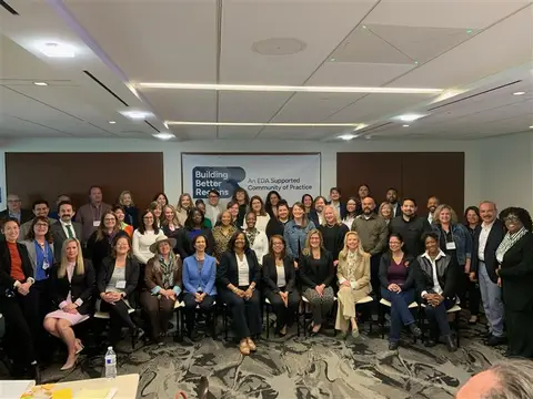 Workshop participants gather for a photo