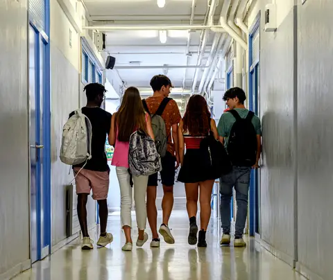 Students walking in hallway