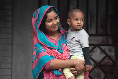 mother holding her child in Bangladseh