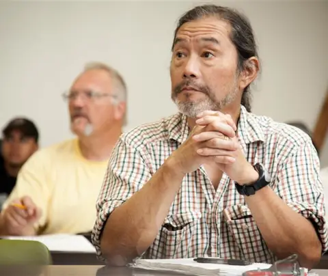 Man sitting in classroom