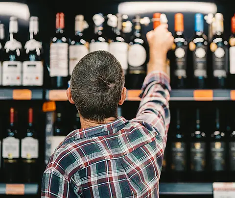 Man shops for alcohol
