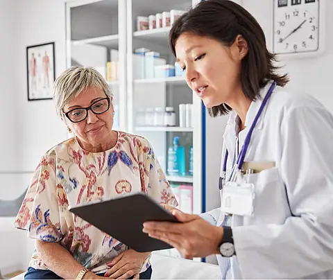Doctor consults patient