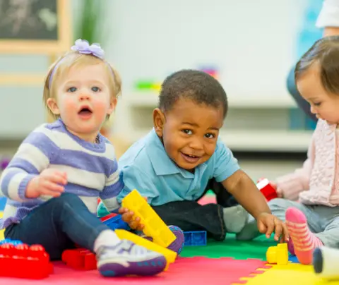 stock image of children playing