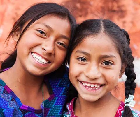 Children smiling at camera