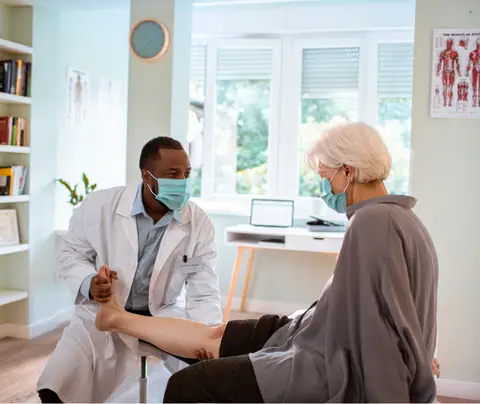 Doctor consults patient