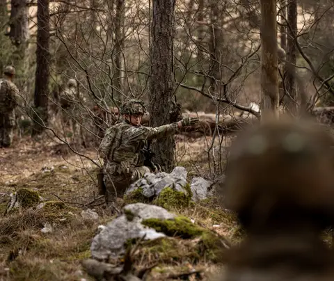 Paratroopers prepare for a training exercise