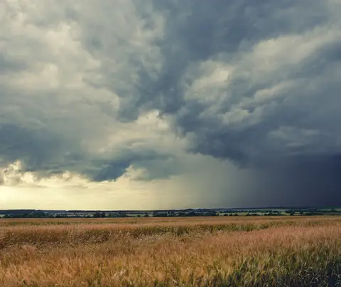 Landscape with rain clouds