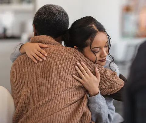 Stock photo of two women embracing