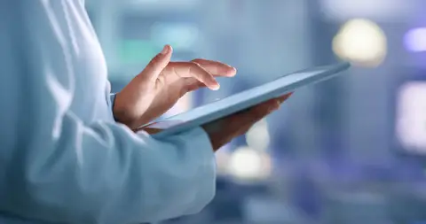 Researcher on a tablet