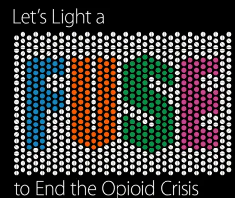 Multicolored "FUSE" text made out of pills; "Let's Light a" and "to End the Opioid Crisis" surrounding text.