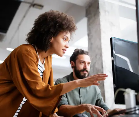 People working at computer